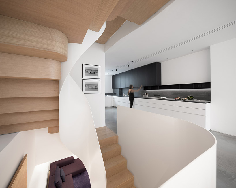FLOW architecture renovates victorian apartment in london with sculpted wooden interiors