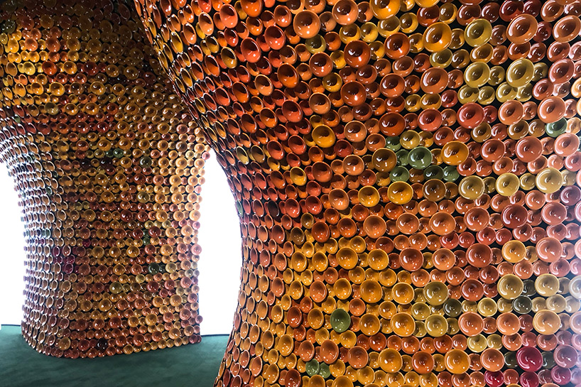 metamorphosis: andrea mancuso creates cavernous, ceramic-clad installation for perrier-jouët