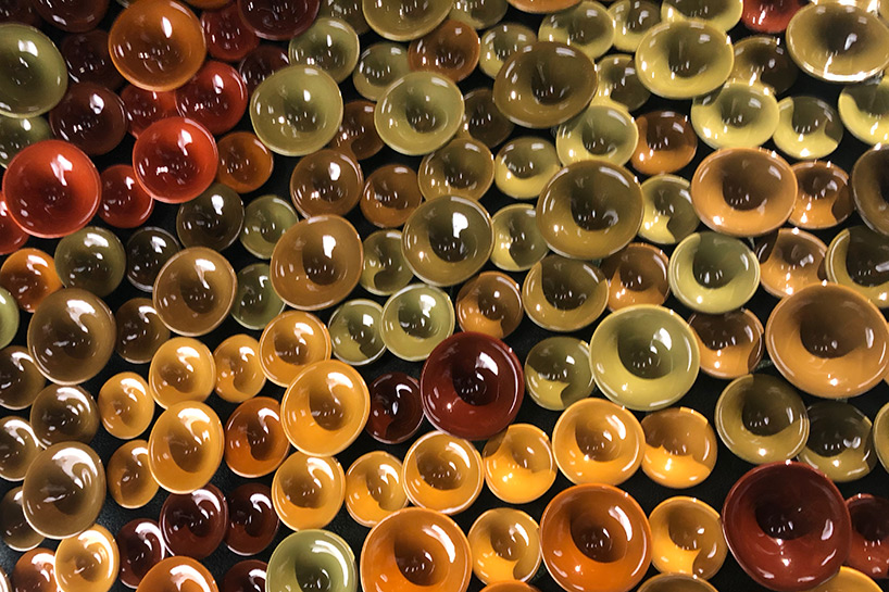 metamorphosis: andrea mancuso creates cavernous, ceramic-clad installation for perrier-jouët