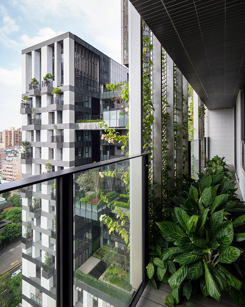 WOHA populates 'sky green' development in taiwan with trees and plants on every level