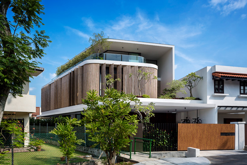  wallflower wraps house in singapore in a bamboo veil of operable screens