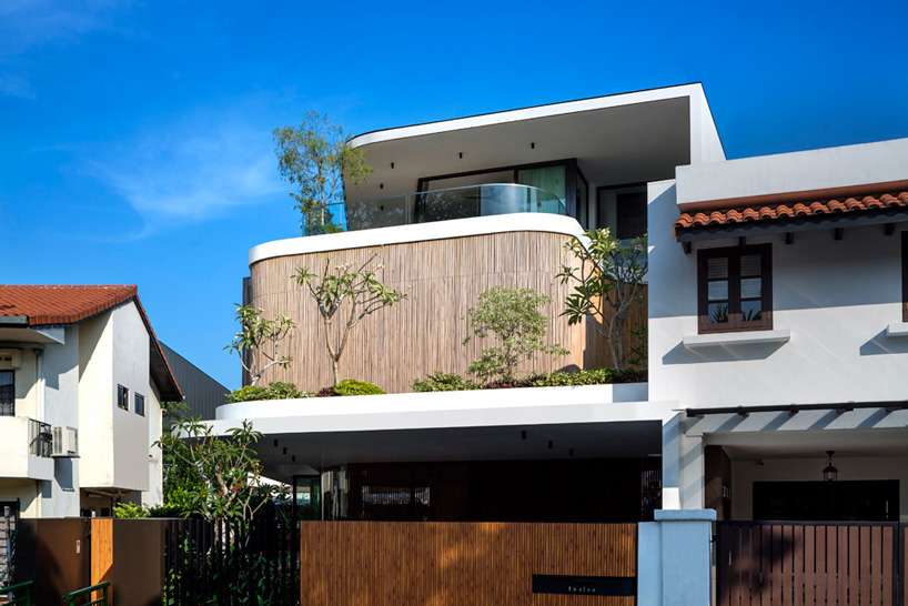 wallflower wraps house in singapore in a bamboo veil of operable screens