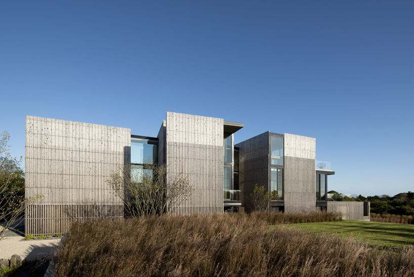 bates masi + architects breaks apart and elevates long island house to embrace flooding