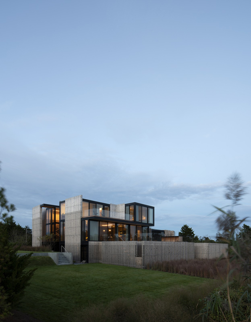 bates masi + architects breaks apart and elevates long island house to embrace flooding