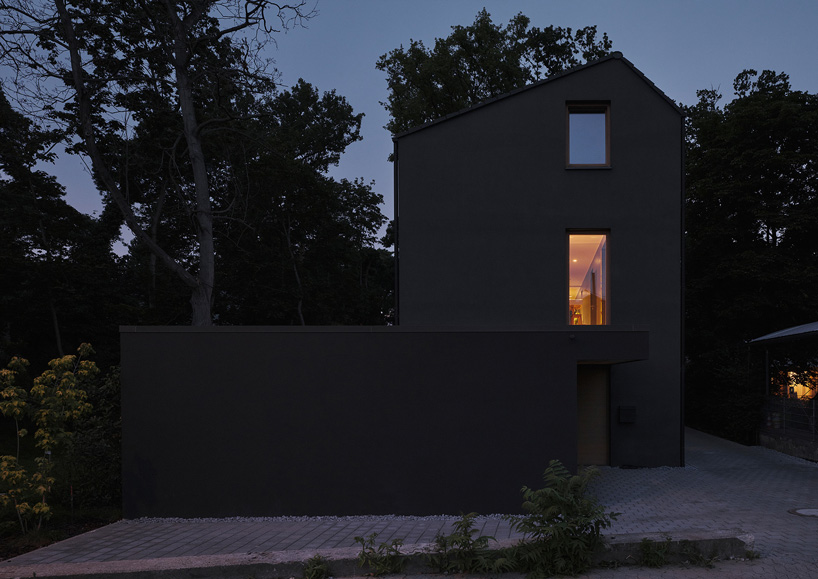 HGA, marc flick & christian stock build monolithic all-black house in  germany