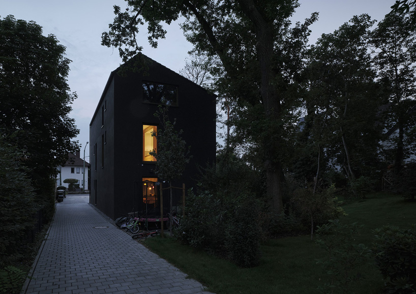 HGA, marc flick & christian stock build monolithic all-black house in  germany