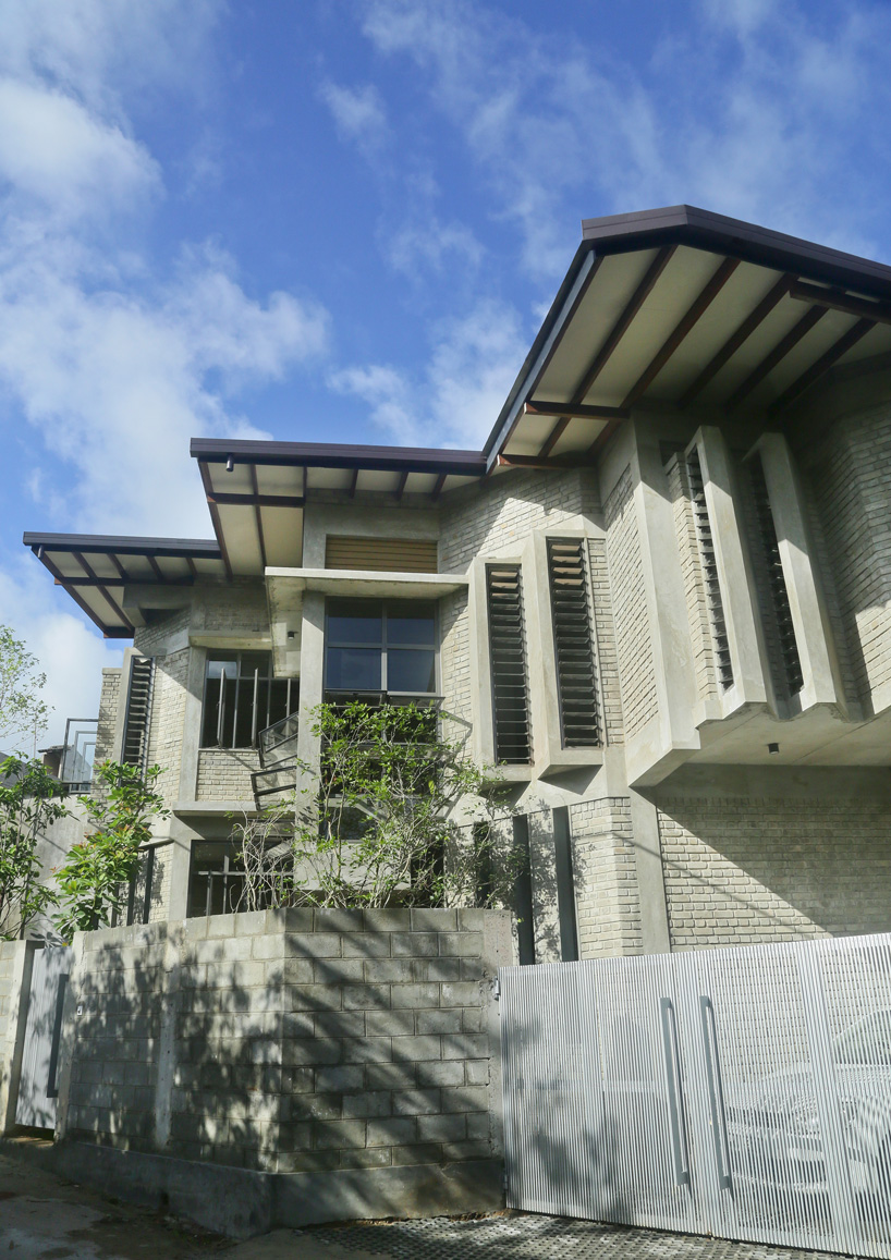 exposed cement bricks form the pagoda house by chinthaka wickramage