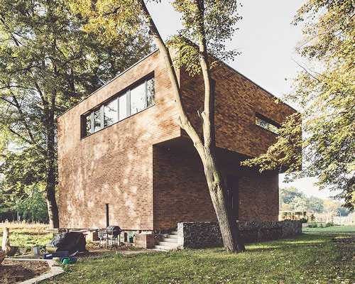 edit! renovates an old brick guardhouse to create a family home in prague