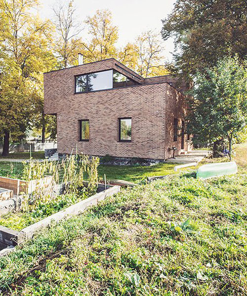 edit! renovates an old brick guardhouse to create a family home in prague