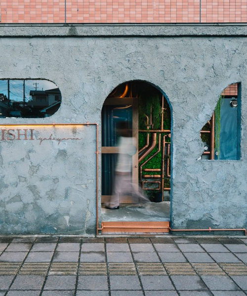 fathom finishes miyanishi yakeyama hair salon in japan with wall of greenery + copper pipes
