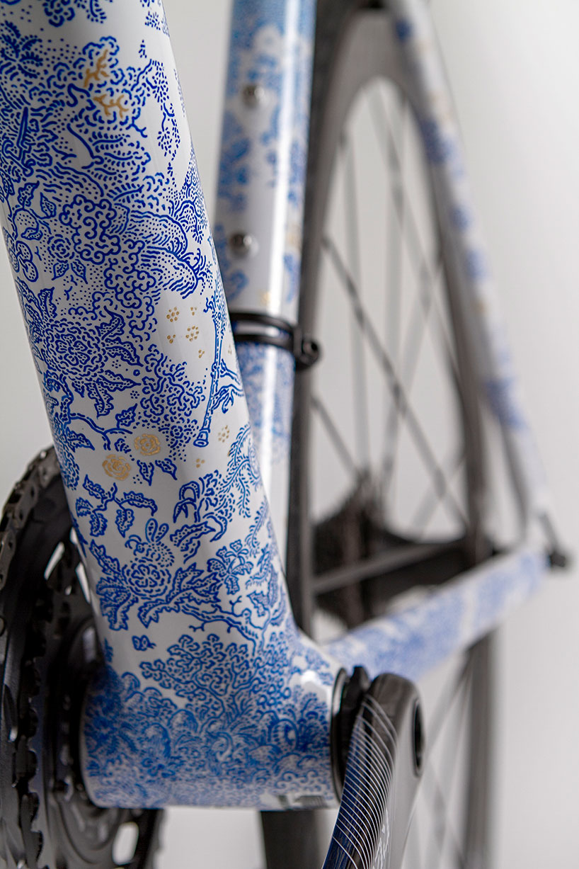 festka produces bespoke porcelain spectre bicycle with gold accents
