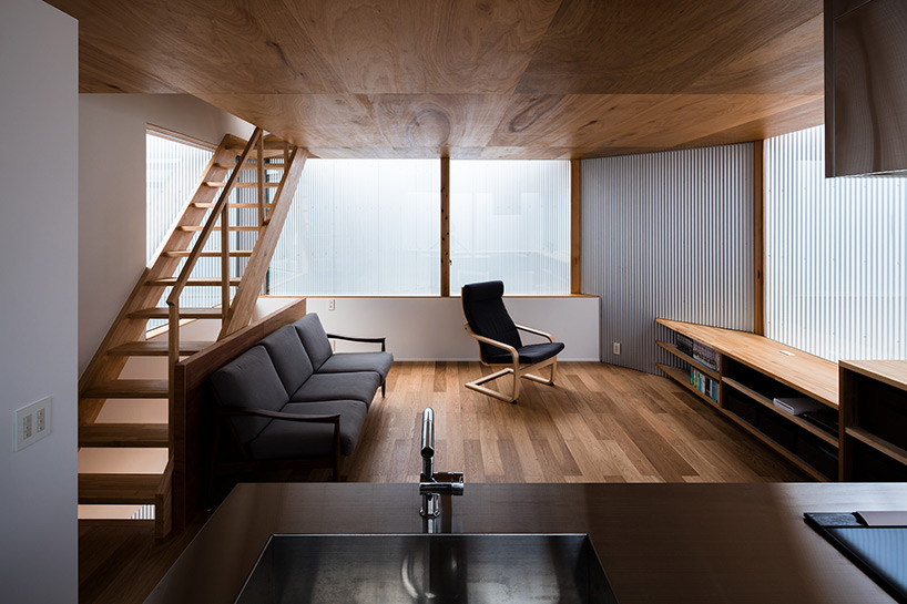 satoshi saito encloses 'house in sakai' behind tall fireproof walls