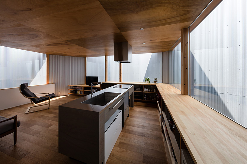 satoshi saito encloses 'house in sakai' behind tall fireproof walls