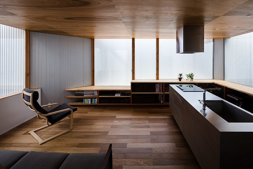 satoshi saito encloses 'house in sakai' behind tall fireproof walls