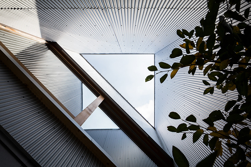 satoshi saito encloses 'house in sakai' behind tall fireproof walls