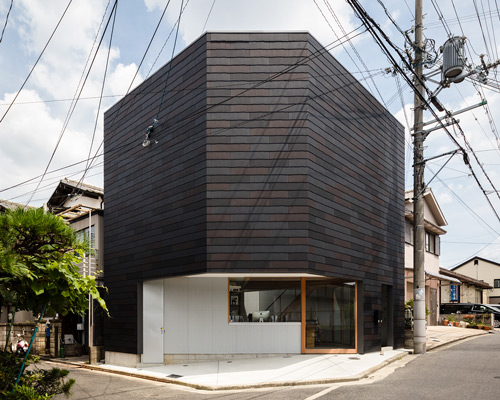 satoshi saito encloses 'house in sakai' behind tall fireproof walls