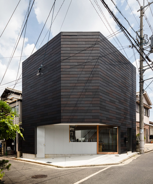 satoshi saito encloses 'house in sakai' behind tall fireproof walls