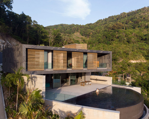 design qua builds house in kalim beach, thailand, with curved infinity pool + bamboo screens