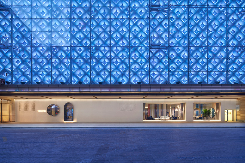 KCA encloses 'the shouter' store in shanghai with cracked concrete walls