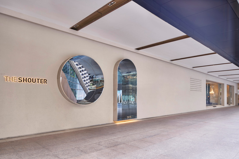 KCA encloses 'the shouter' store in shanghai with cracked concrete walls