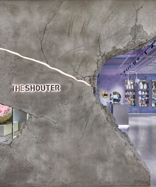 KCA encloses 'the shouter' store in shanghai with cracked concrete walls