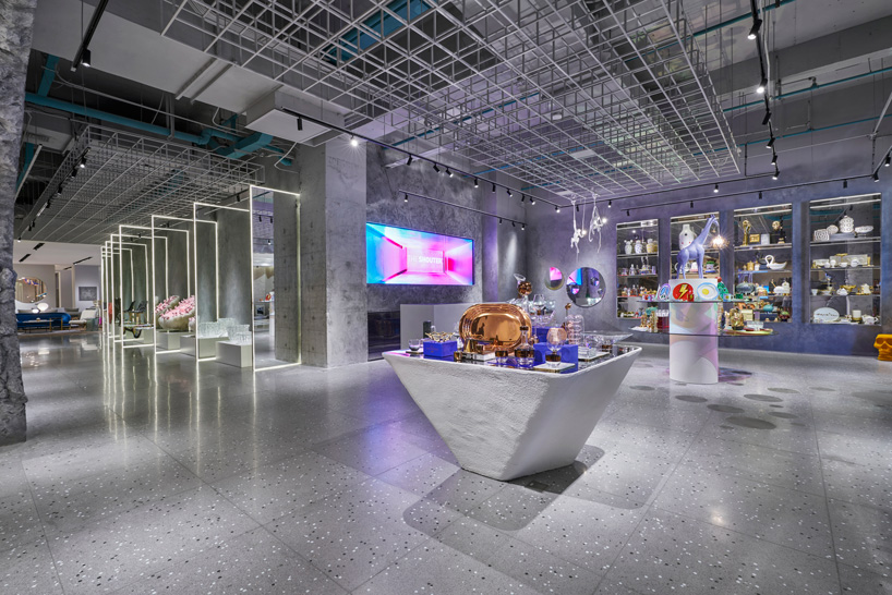 KCA encloses 'the shouter' store in shanghai with cracked concrete walls