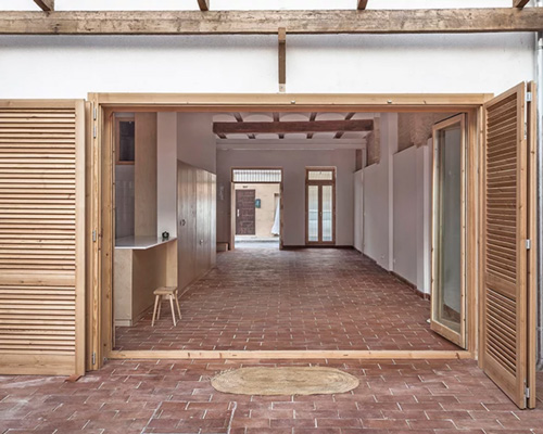 paco oria estudio transforms 100-year-old house into casa rocafull in valencia