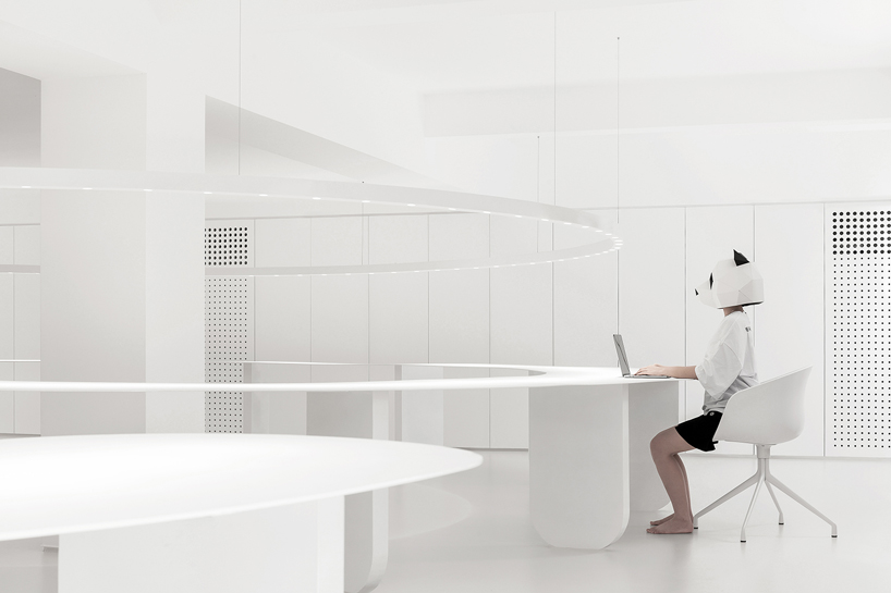 panda design builds a new office around a curved workspace in xiamen, china designboom