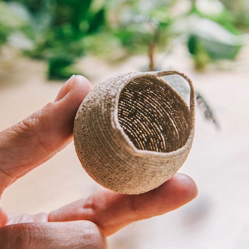 raya sader bujana intricately crafts tiny houseplants and woven baskets from paper designboom