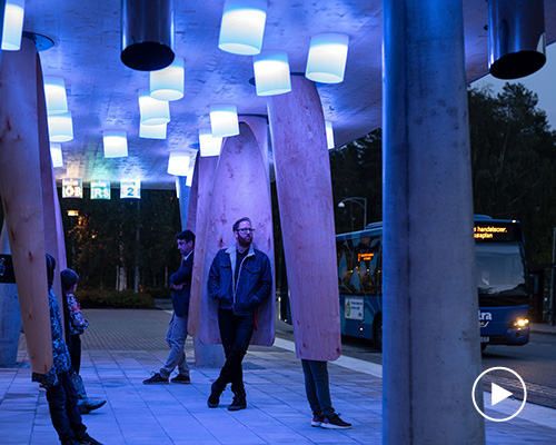 rombout frieling lab's interactive bus stop has rotating pods that serve as windshields
