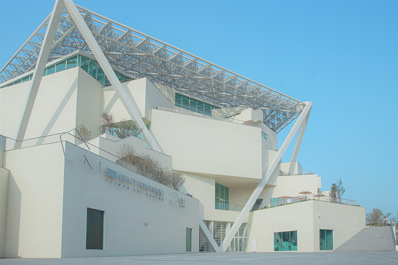 shigeru ban encloses tainan art museum beneath pentagonal roof canopy