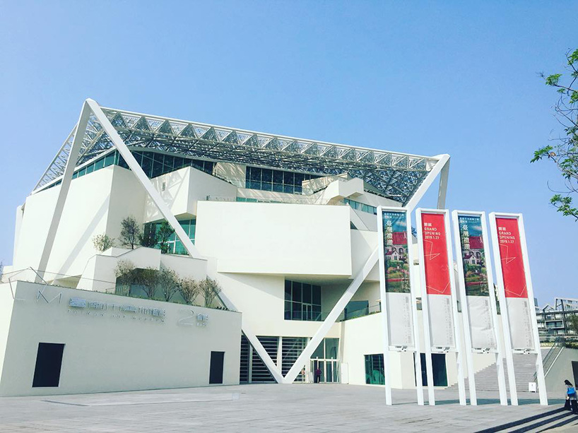 shigeru ban encloses tainan art museum beneath pentagonal roof canopy
