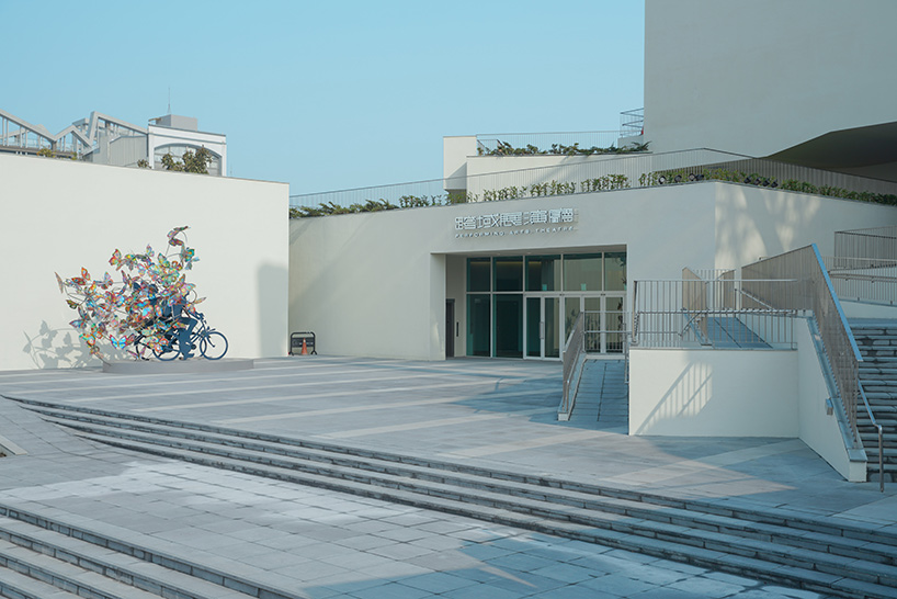 shigeru ban encloses tainan art museum beneath pentagonal roof canopy