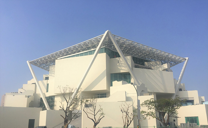shigeru ban encloses tainan art museum beneath pentagonal roof canopy