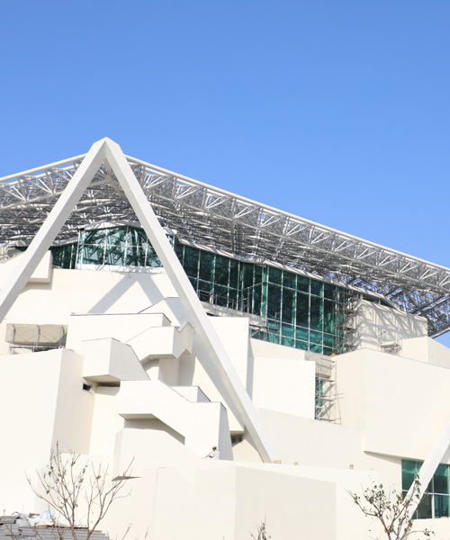 shigeru ban encloses tainan art museum beneath pentagonal roof canopy