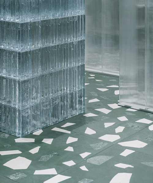 studio 10 combines glass bricks with green terrazzo for concept store in shenzhen