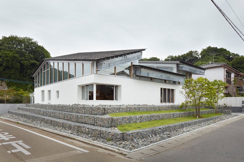 takao shiotsuka atelier tops taketa city library in japan with fragmented gable roof