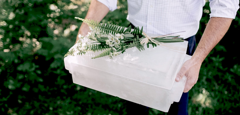 the ice urn floats on water whilst slowly returning cremated remains to nature