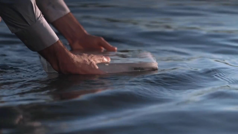 the ice urn floats on water whilst slowly returning cremated remains to nature