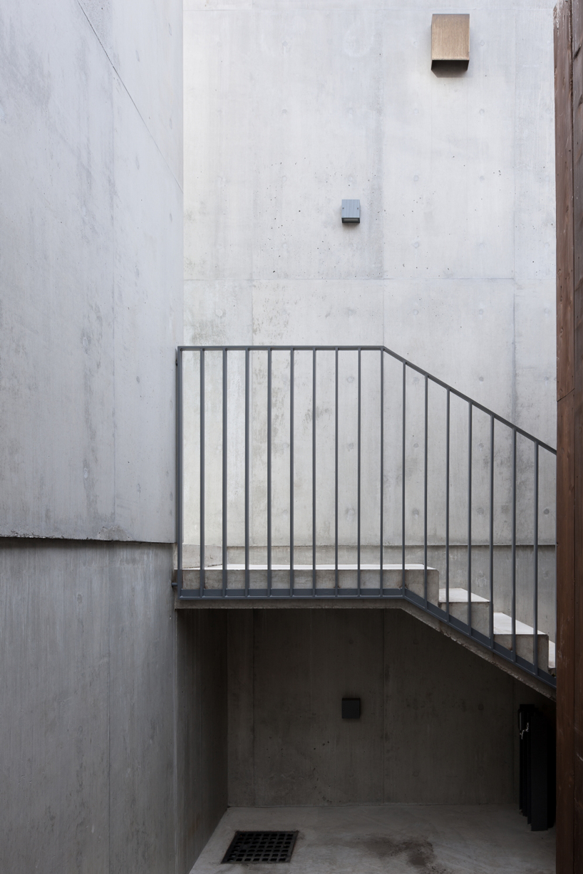 nobuo araki combines three concrete blocks into 'the mass' museum complex in tokyo