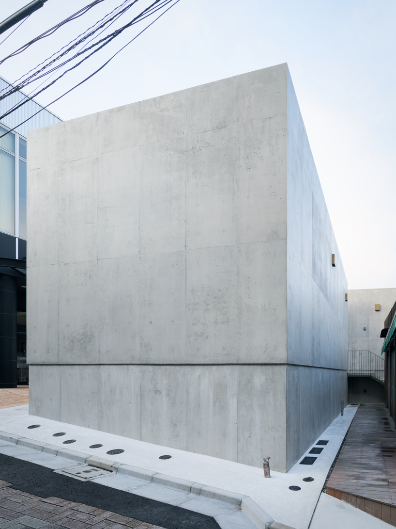 nobuo araki combines three concrete blocks into 'the mass' museum complex in tokyo