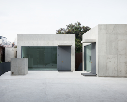 nobuo araki combines three concrete blocks into 'the mass' museum complex in tokyo