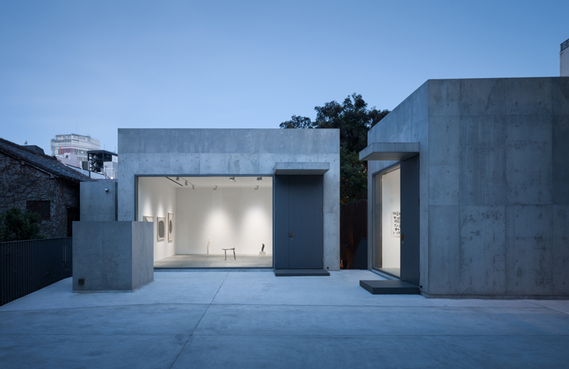 nobuo araki combines three concrete blocks into 'the mass' museum complex in tokyo