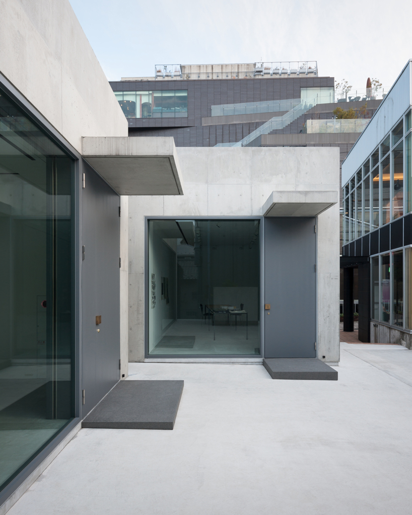 nobuo araki combines three concrete blocks into 'the mass' museum complex in tokyo