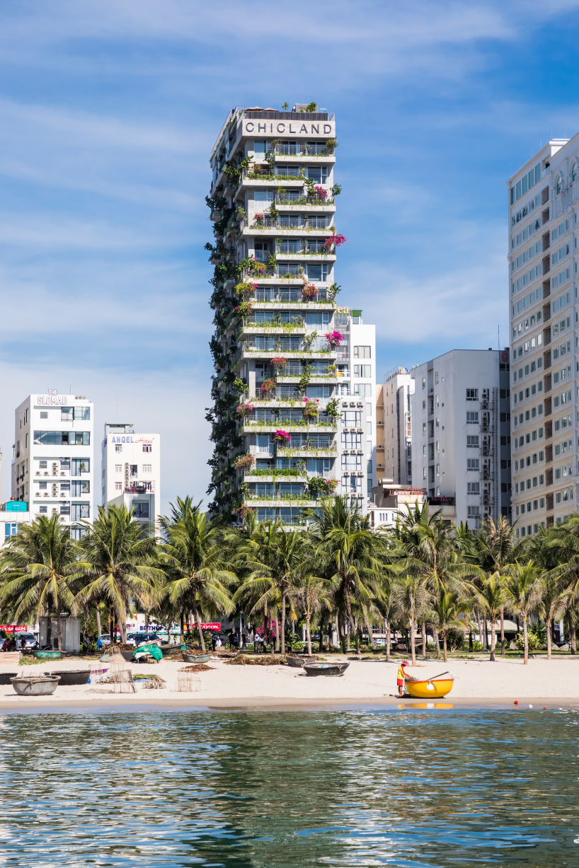 VTN architects completes chicland hotel in vietnam with green balconies