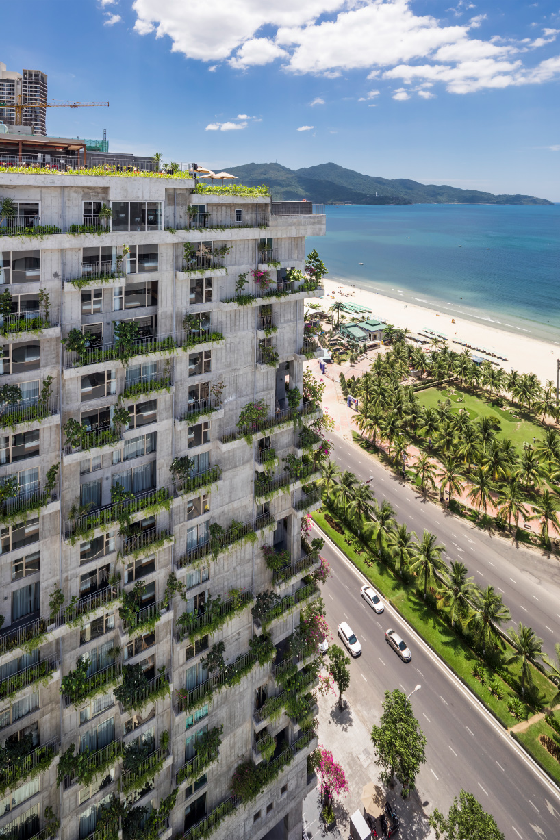 VTN architects completes a beachfront hotel in vietnam with green balconies