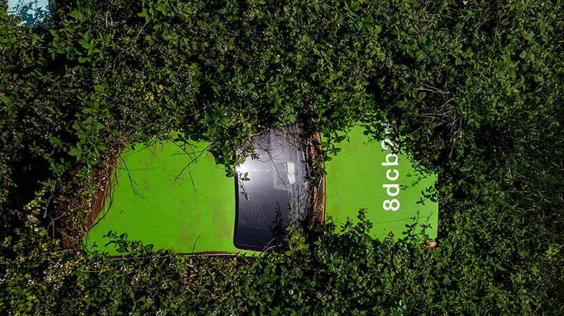 zoer paints over 144 wrecked cars to create a large-scale color chart