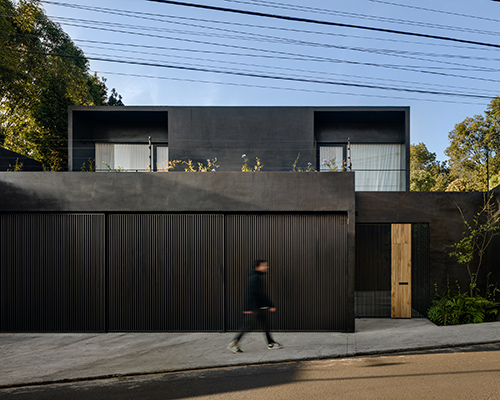 PPAA introduces matte black geometries to lush mexico city with its lluvia house