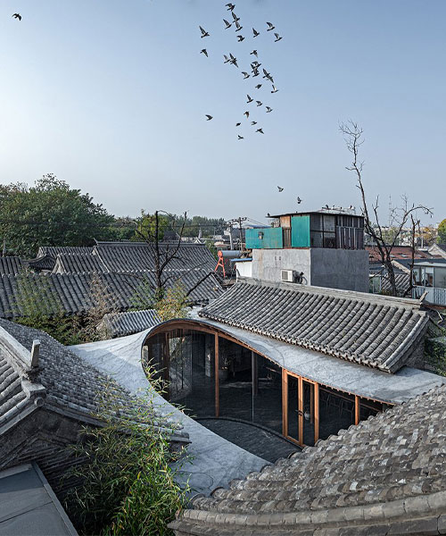 archstudio fuses old with new to renovate a traditional siheyuan residence in beijing