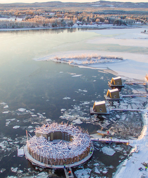 sweden's floating, circular 'arctic bath' hotel opens on the lule river